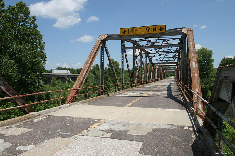 Note the semi crossing the Interstate 44 bridge in the background. Despite the presence of the modern interstate, this bridge still provides a link to people living on either side of the river.